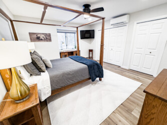 Upstairs primary bedroom with en-suite full bathroom Upstairs primary bedroom with en-suite full bathroom